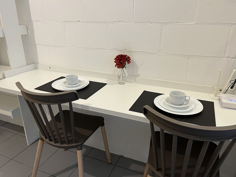 Studio compacto e confortável no coração da cidade