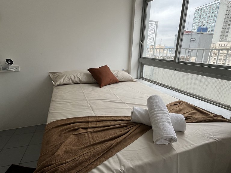 Studio compacto e confortável no coração da cidade