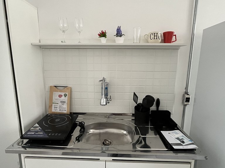 Studio compacto e confortável no coração da cidade