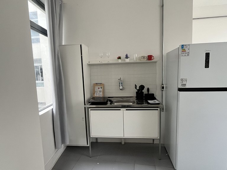 Studio compacto e confortável no coração da cidade